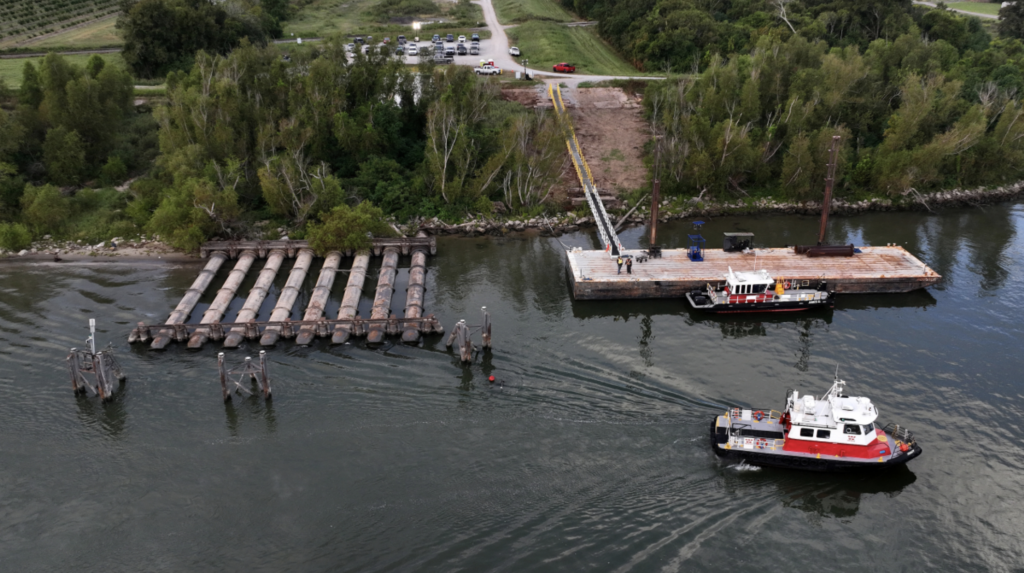 October 9, 2023: An aerial view shows low water levels on the Mississippi River in Belle Chasse, Louisiana, revealing pipes that are typically underwater. The low water levels caused barges and ships to run aground along parts of the Mississippi River in October and created saltwater intrusion concerns in southern Louisiana. (Image credit: Justin Sullivan/Getty Images)